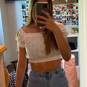 Ruffled off-the-shoulder cropped top
